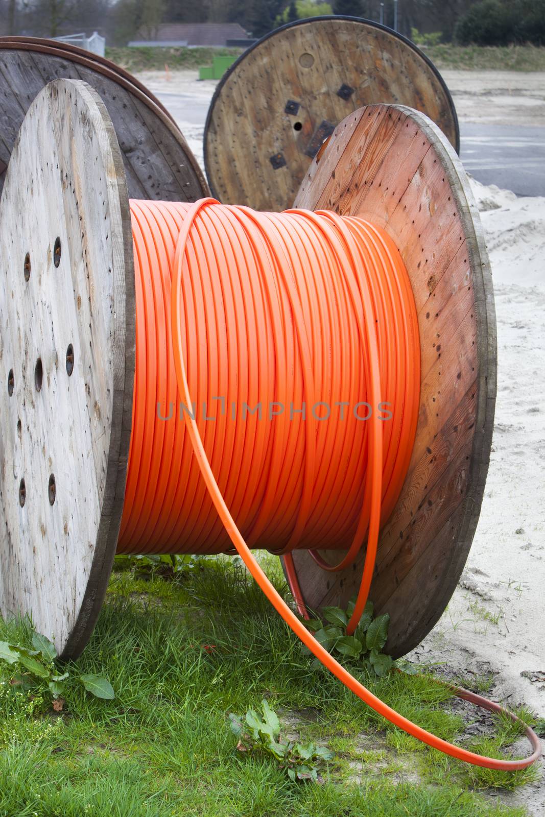 Industrial spools with orange cable in the Netherlands