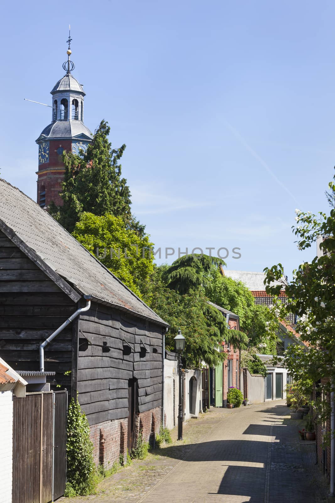 Old cozy street in Buren in the Netherlands