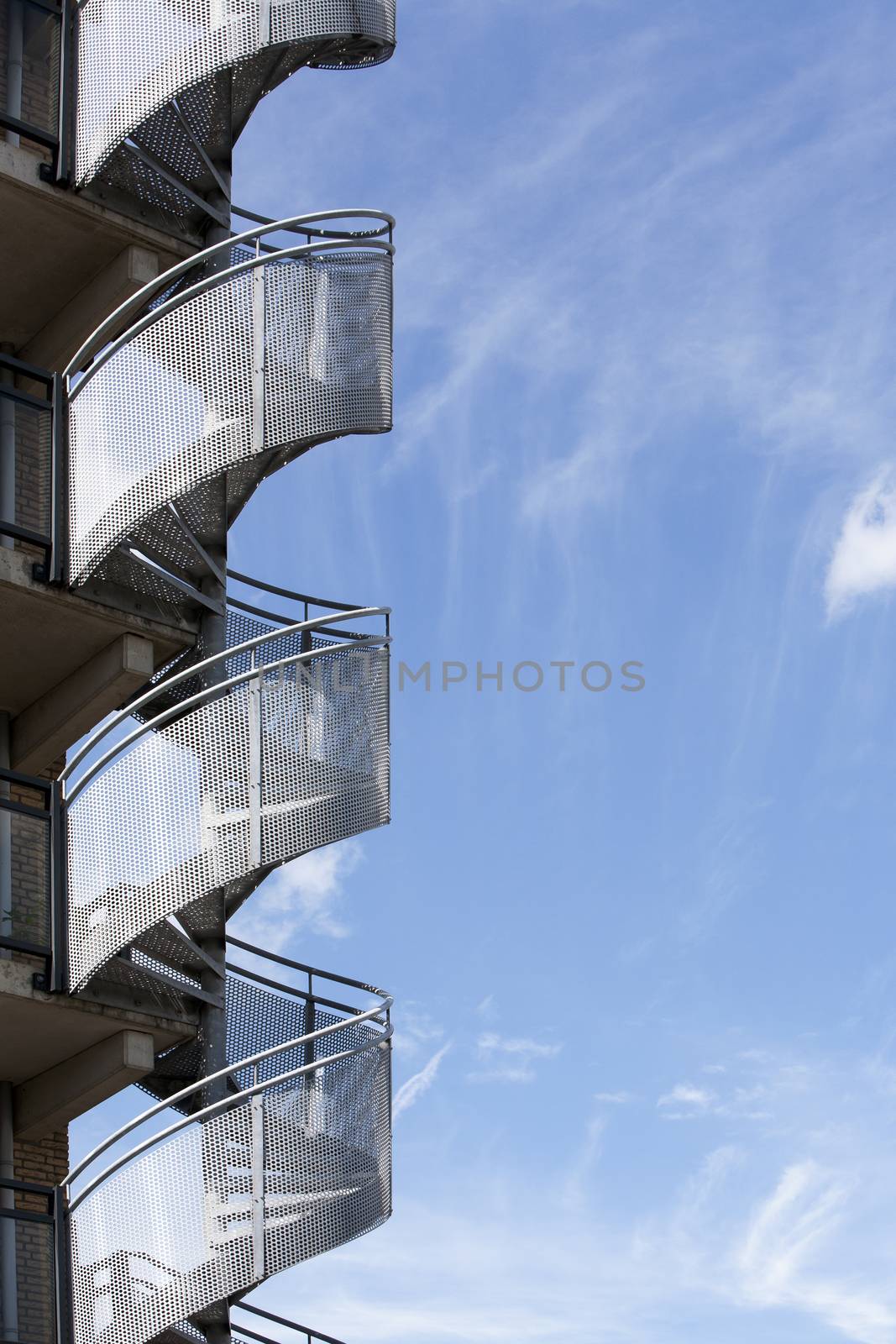 Spiral staircase and a beautiful sky