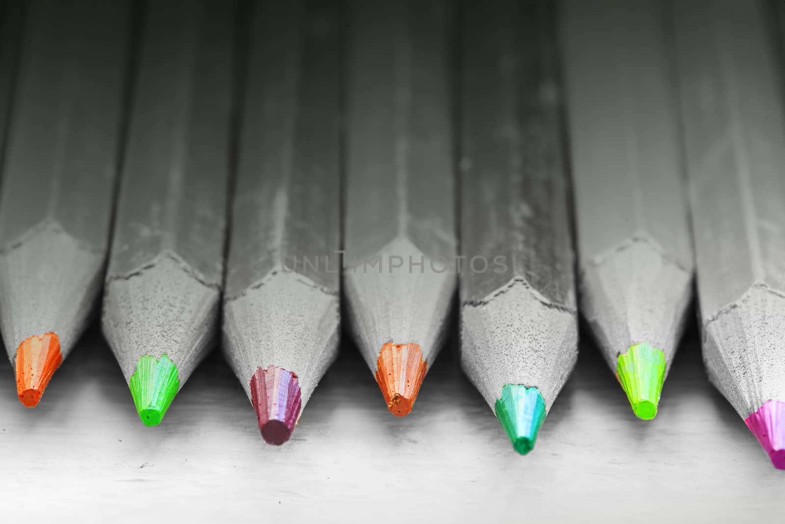 Group of color pencils in black and white