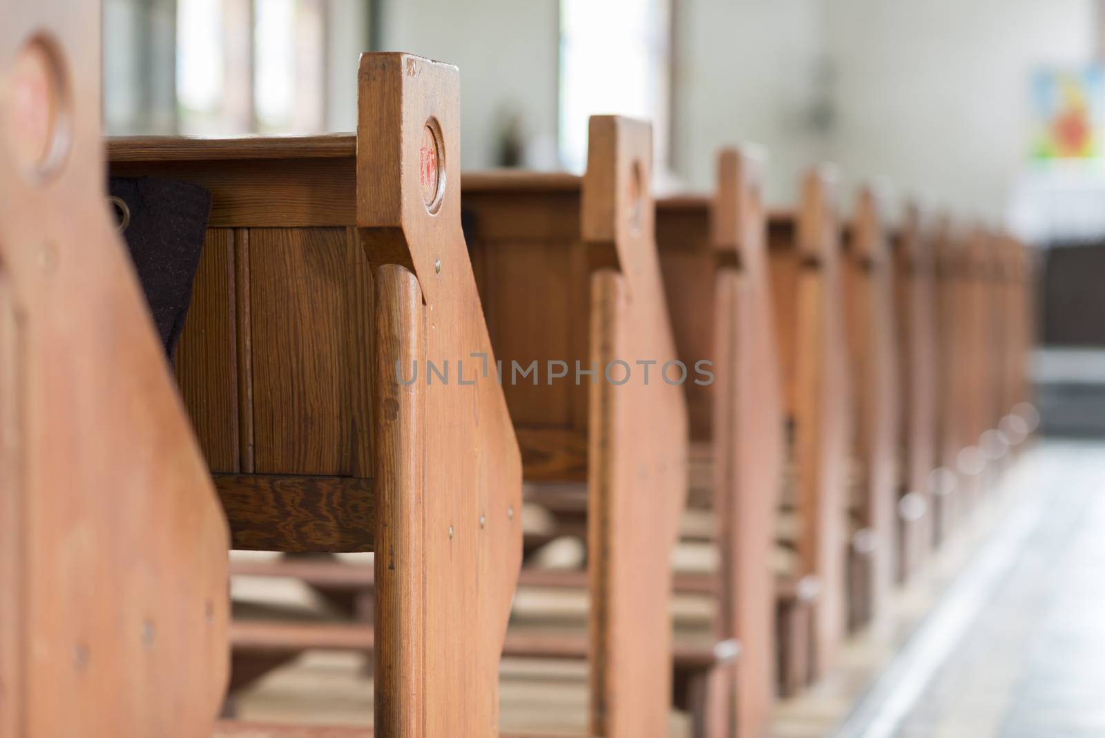 Pews in a historic church in the Netherlands
