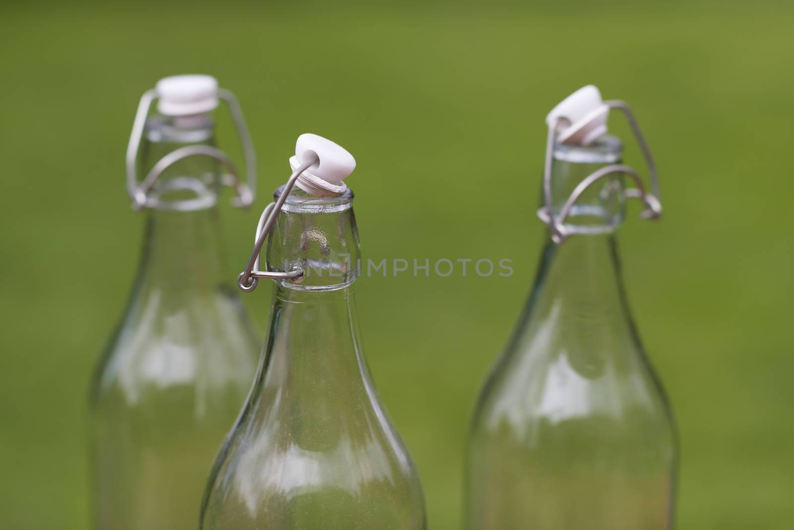 Three old-fashioned authentic milk bottles
 by Tofotografie