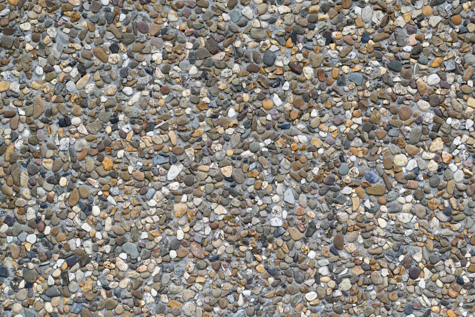 Background photo of colored gravel in a concrete precast slab
 by Tofotografie