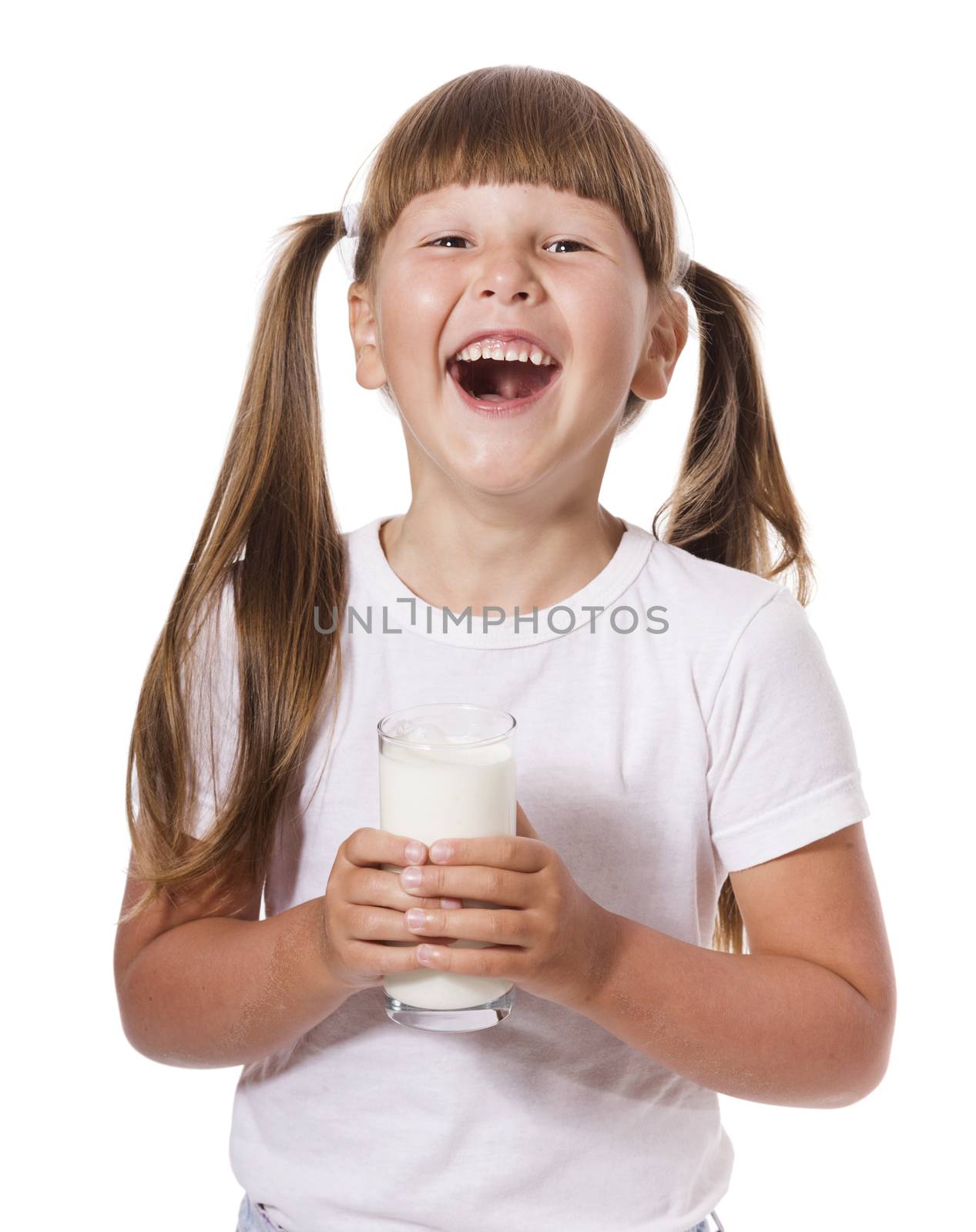 Six years Girl holding glass of milk isolated on white