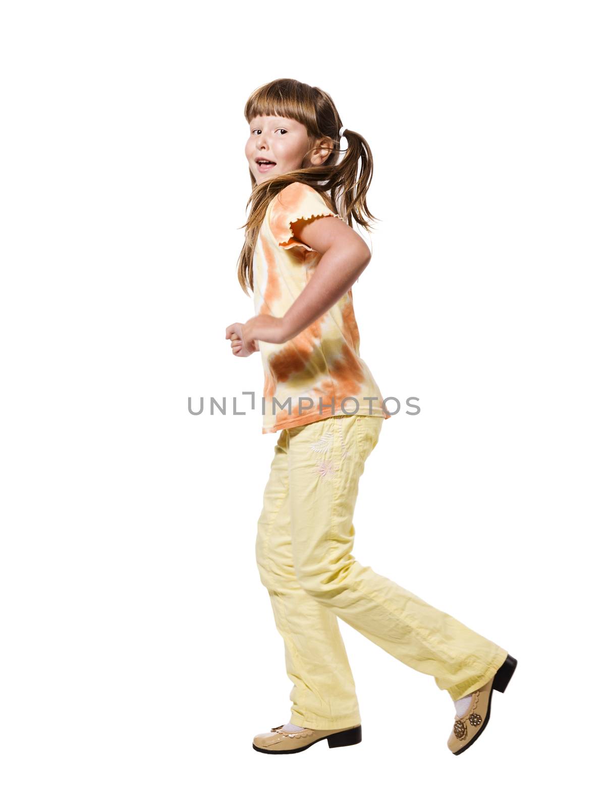 Happy excited walking girl isolated on white