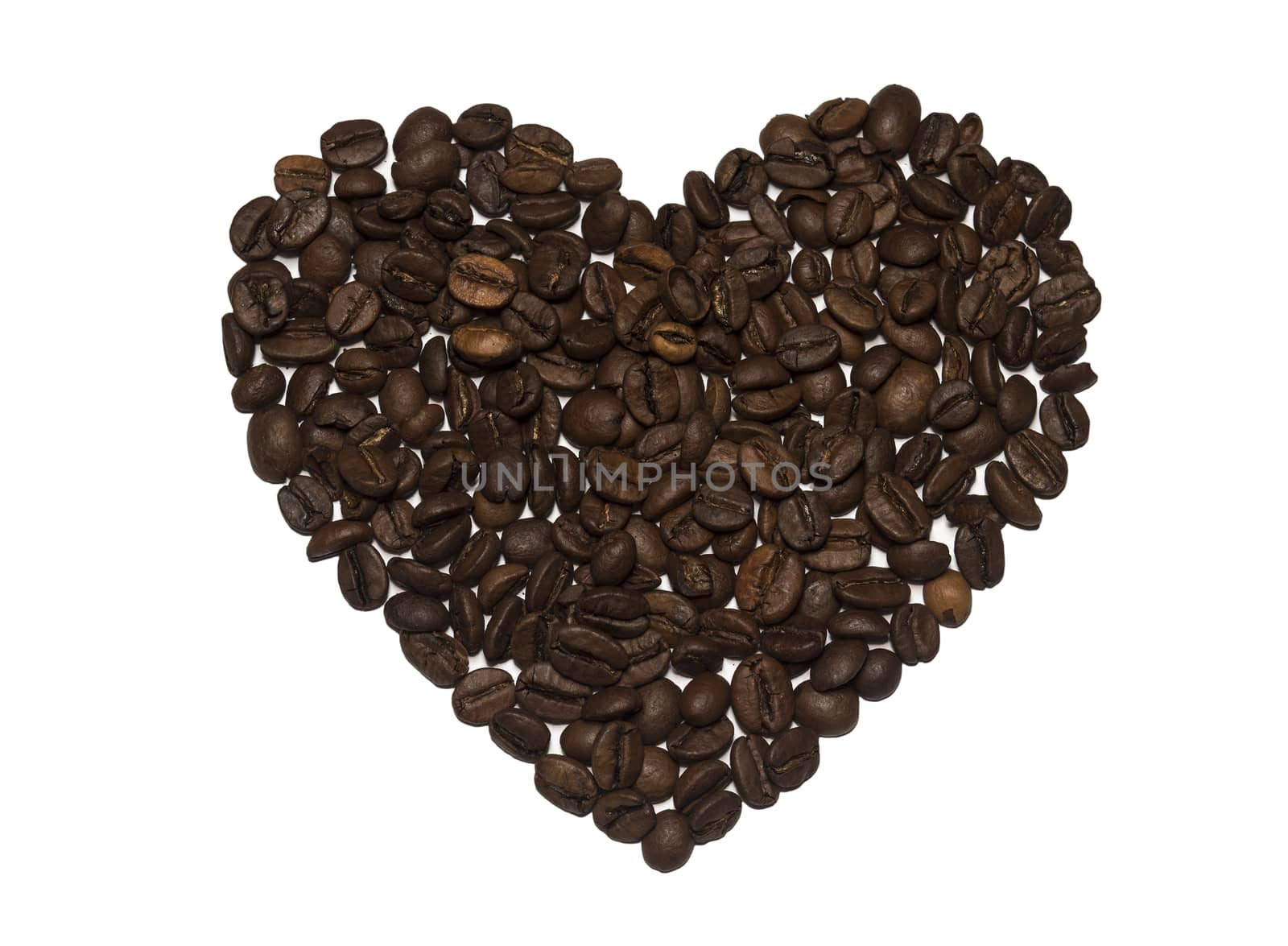 Heart shaped coffee beans isolated on white background