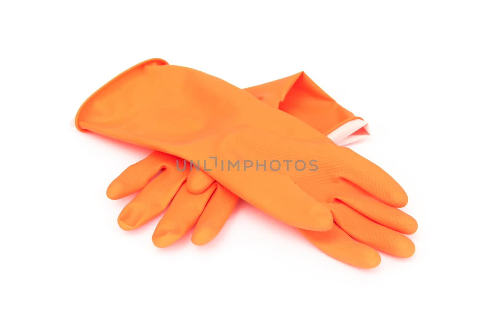 Orange color rubber gloves for cleaning on white background, workhouse concept