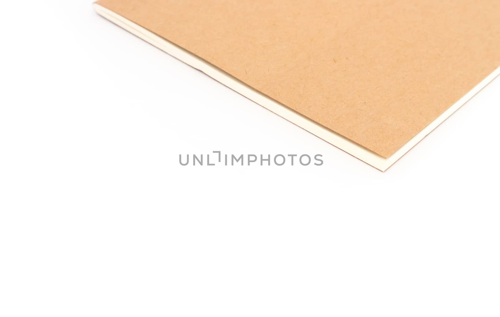 Closeup brown notebook color on white background