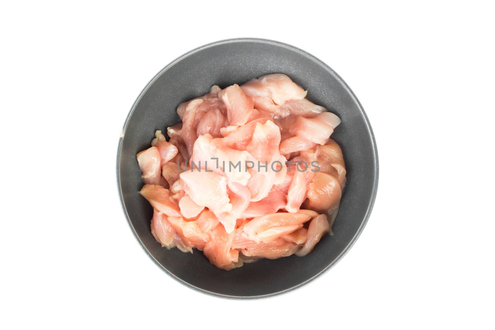 Top view pieces of raw chicken fillet in bowl on white backgroun by pt.pongsak@gmail.com