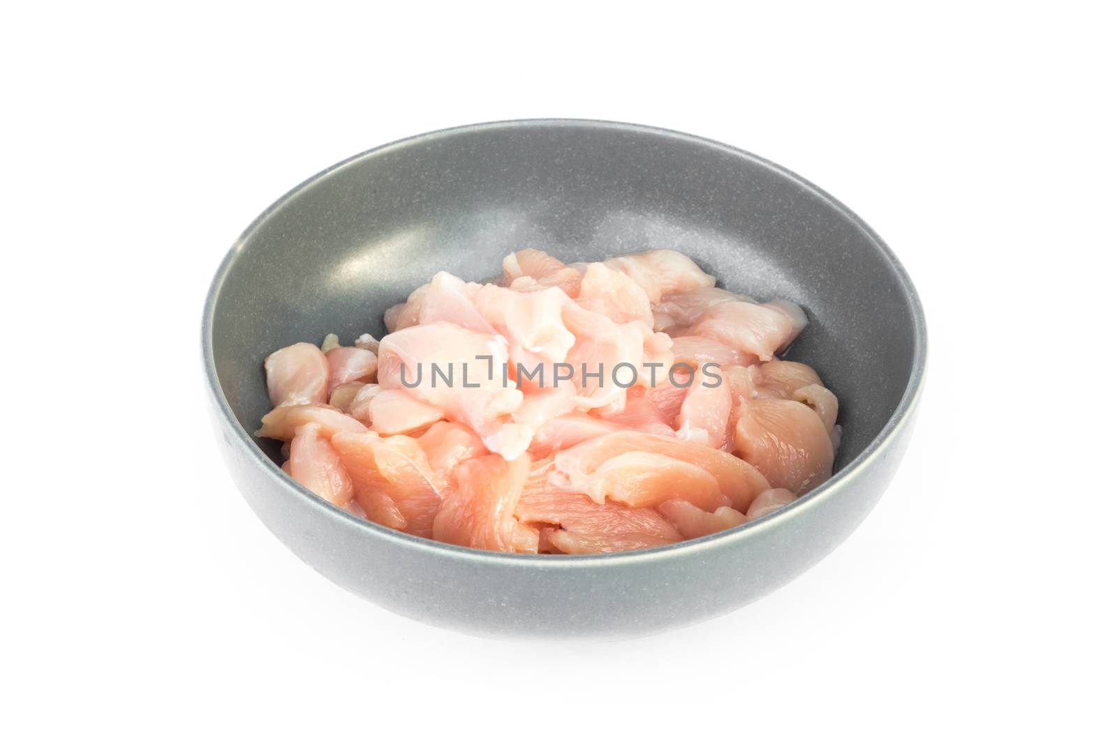 Pieces of raw chicken fillet in bowl on white background, raw ma by pt.pongsak@gmail.com