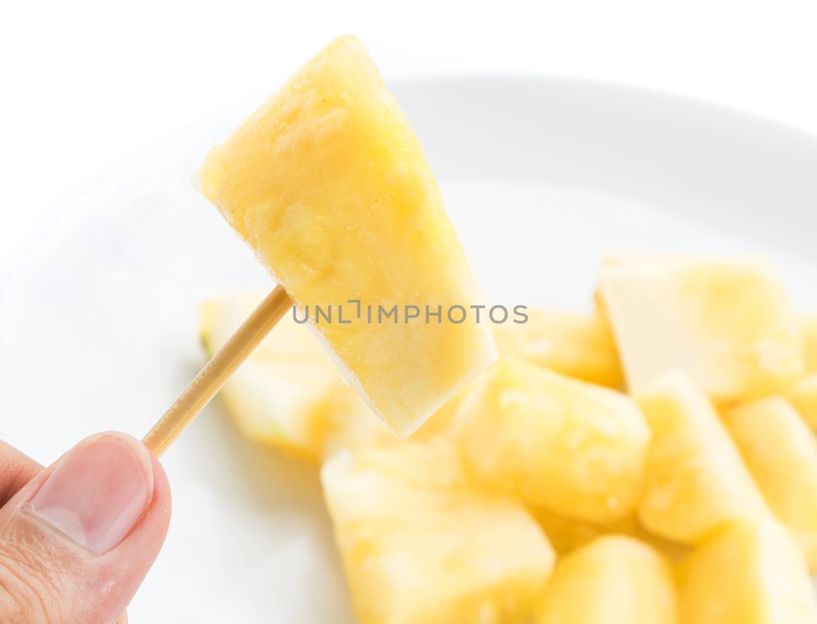 Hand hold Pineapple slices on white background, Fruit for healthy