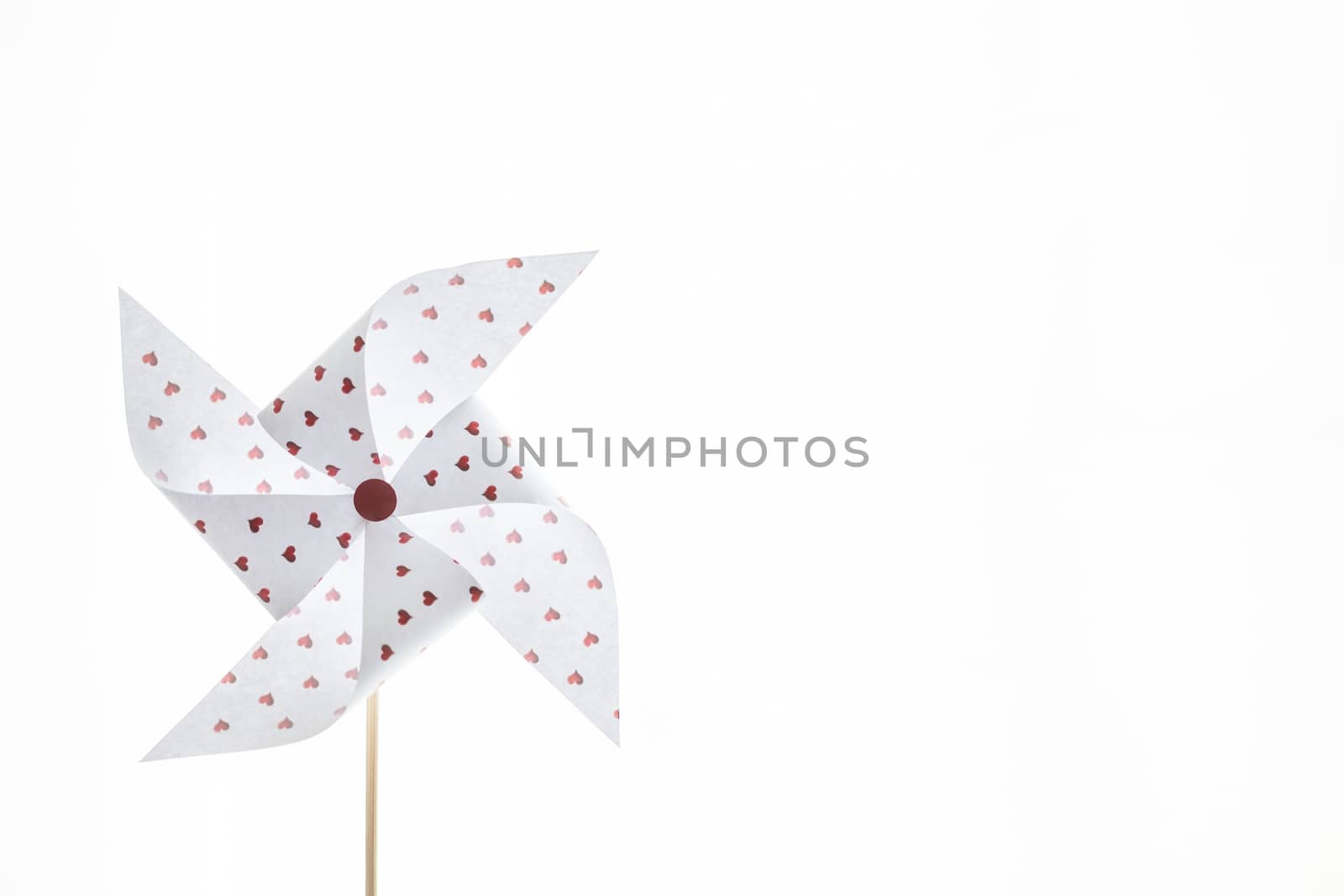 Hearts paper pinwheel isolated on white background