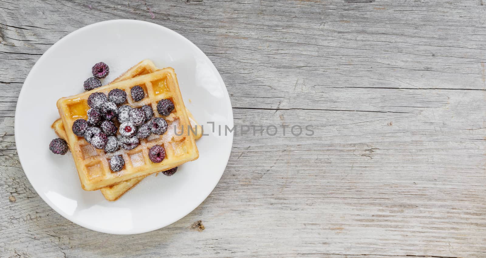 Waffles and fresh berries by Epitavi