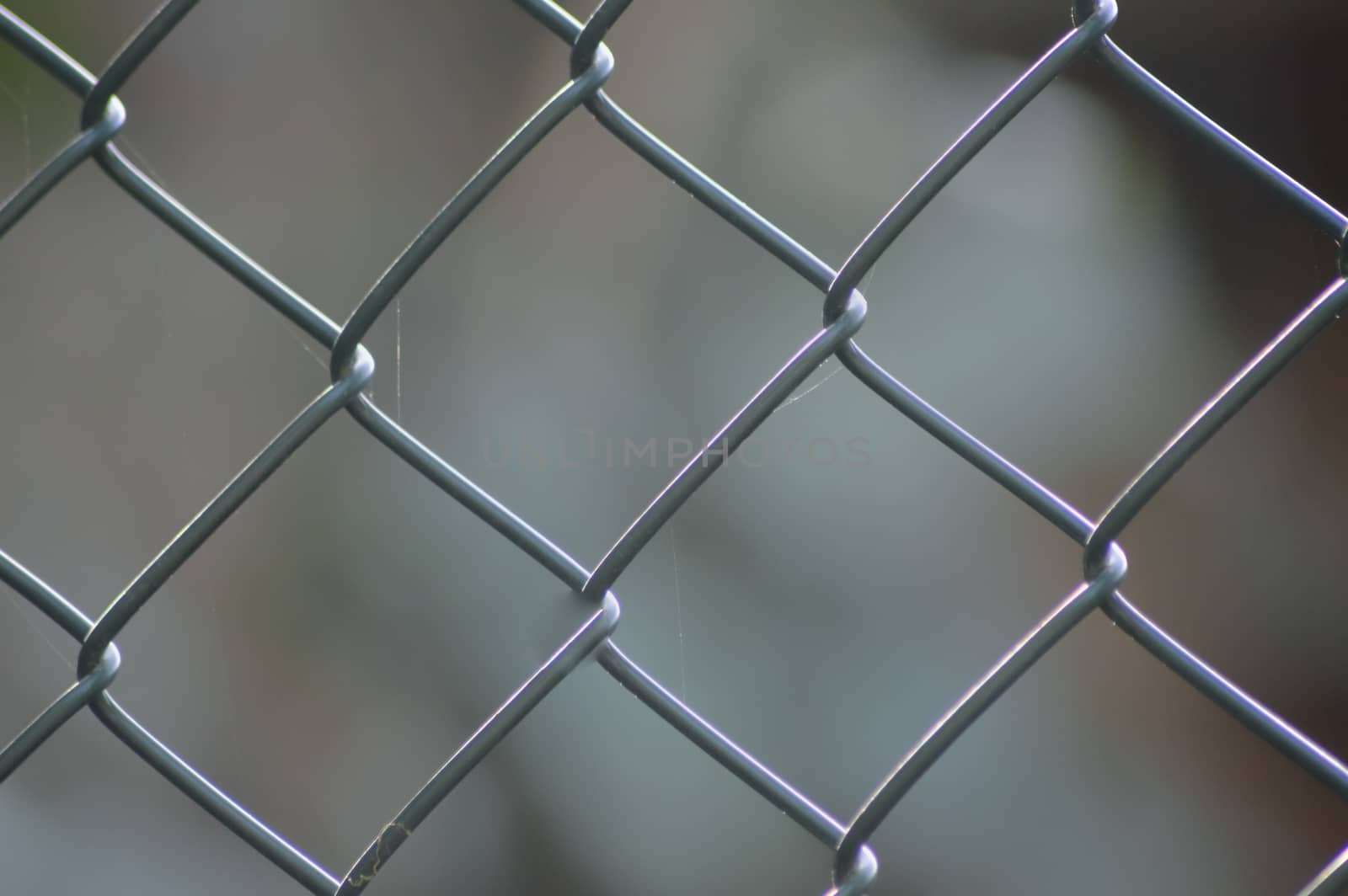 Twisted iron wire on a blurred background