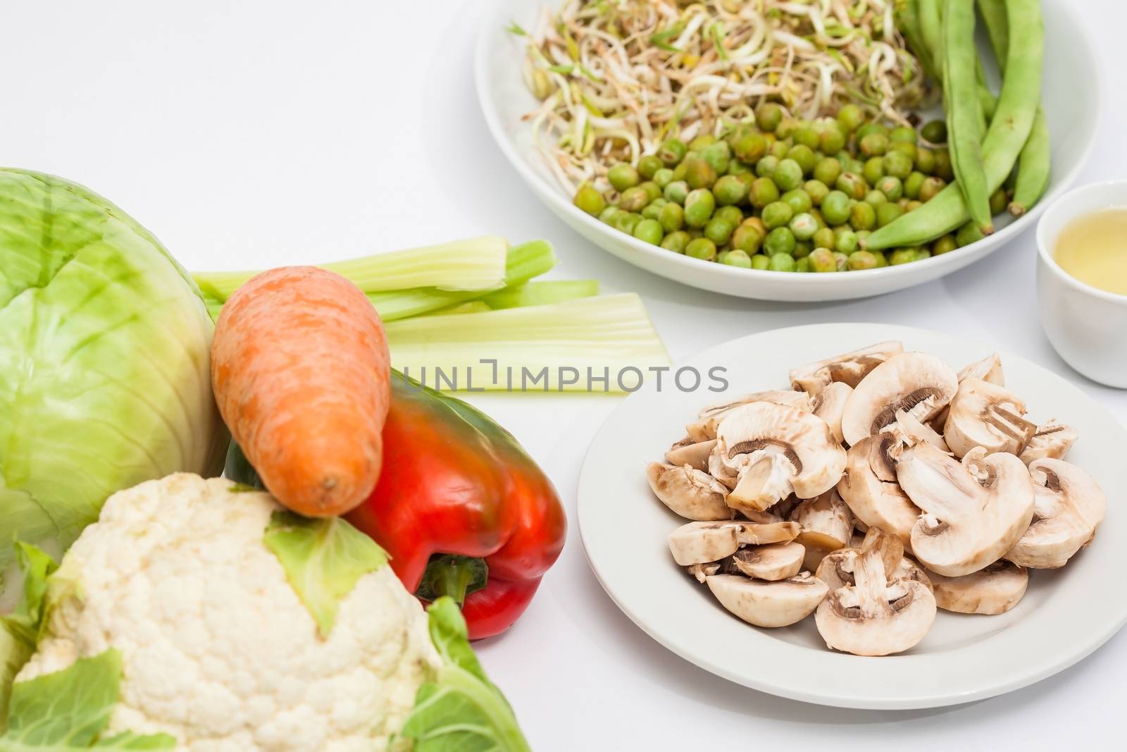 Sauteed vegetables with chicken, pork, jam and shrimps preparation: Raw ingredients to prepare sauteed vegetables