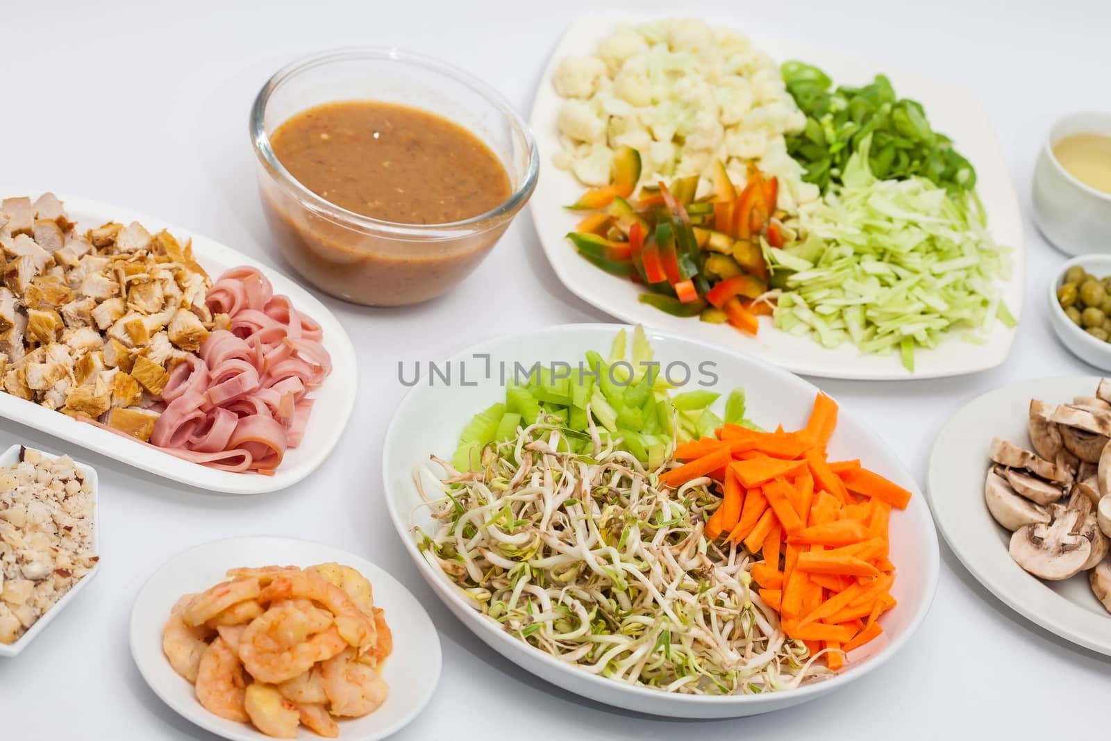 Sauteed vegetables with chicken, pork, jam and shrimps preparation : Chopped vegetables and meats