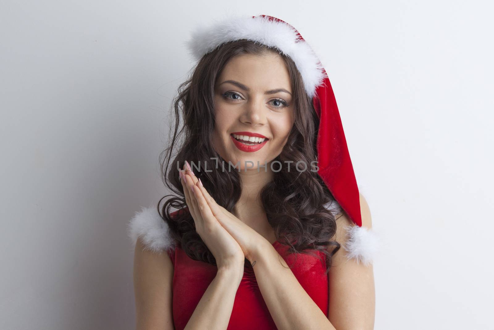 Portrait of beautiful sexy girl wearing santa claus clothes