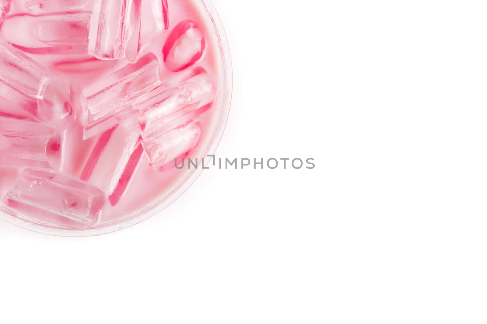 Closeup top view ice of strawberry sweet milk pink in takeaway cup on white background