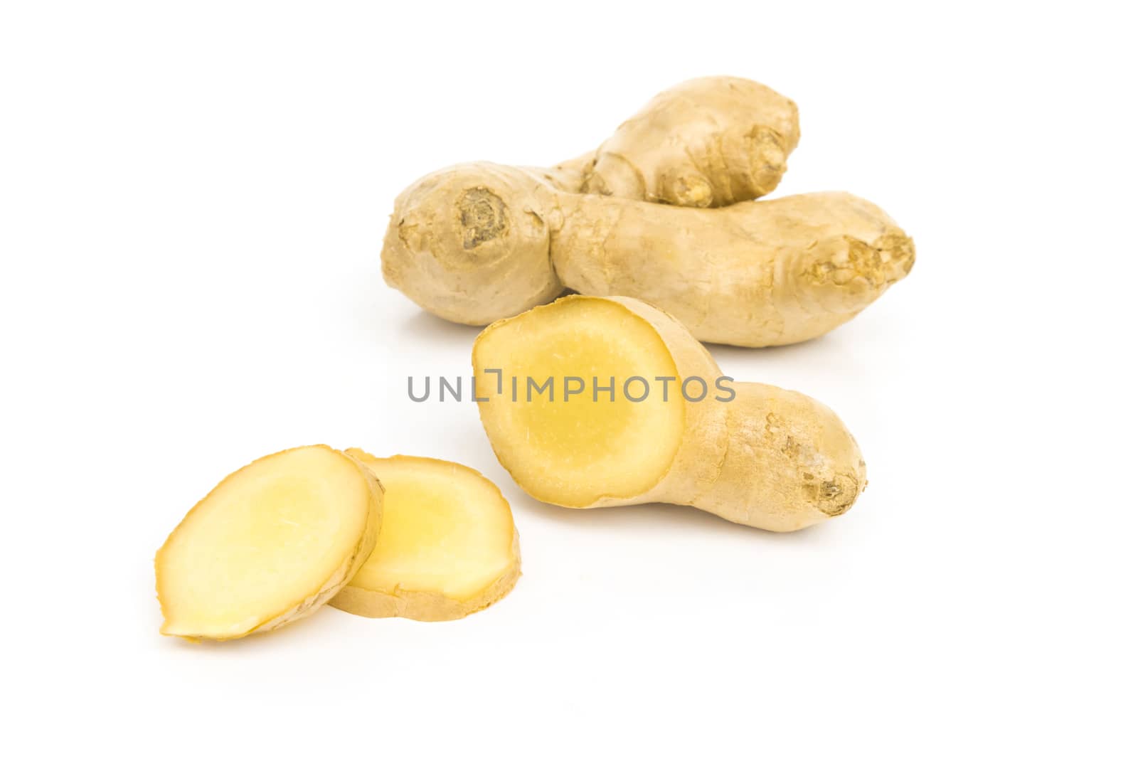 Fresh ginger slice on white background,raw material for cooking