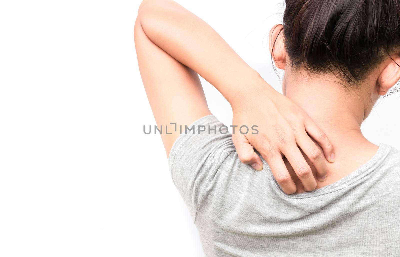 Woman Itching on shoulder with white background for healthy concept