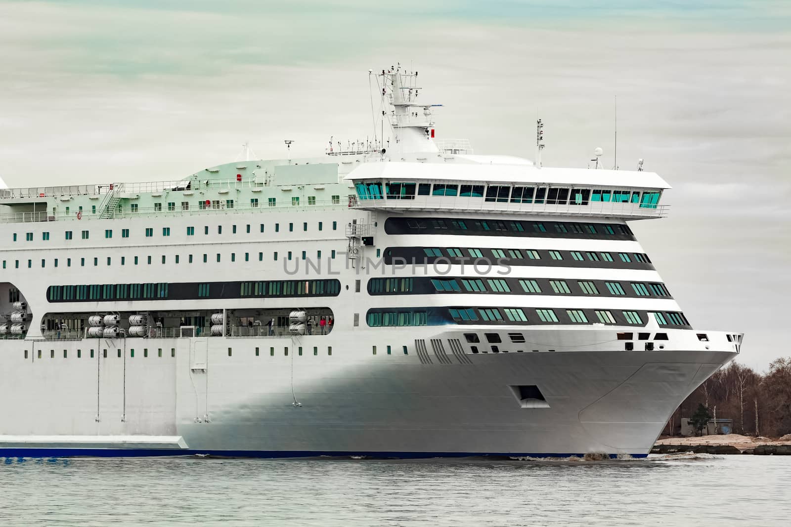 White cruise liner sailing on a clear day