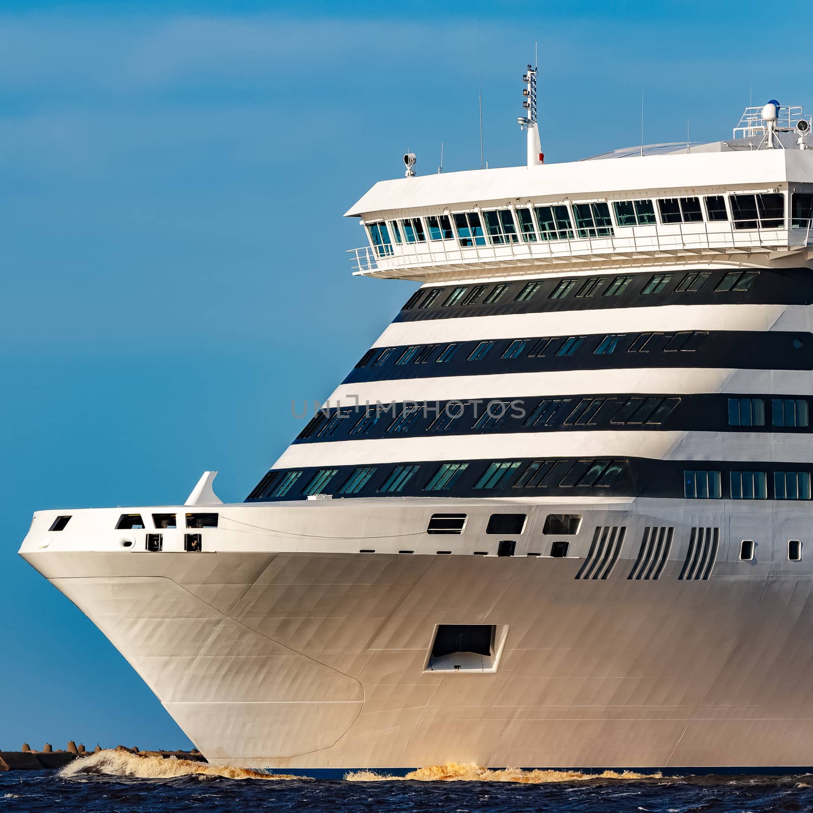 White cruise liner sailing on a clear day