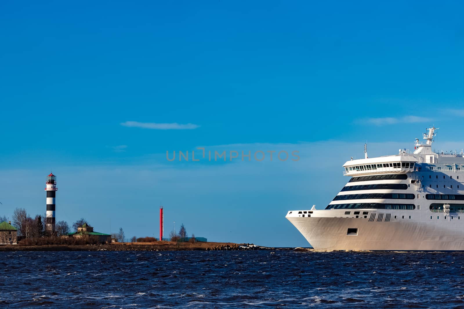 White cruise liner sailing on a clear day