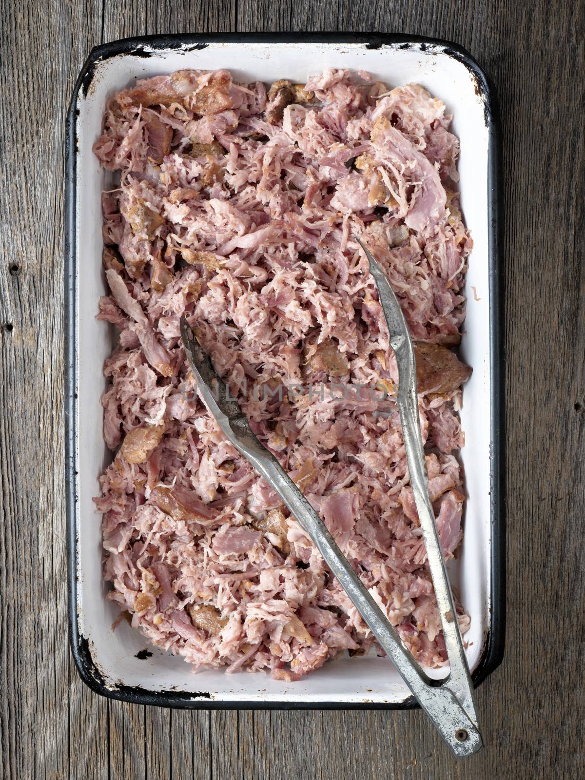 close up of a tray of rustic american  barbecued pulled pork