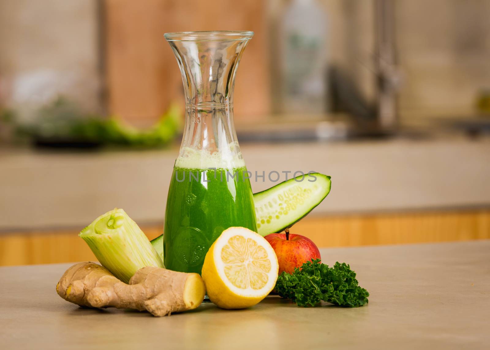 Glass jar of green juice, a detox beverage.  