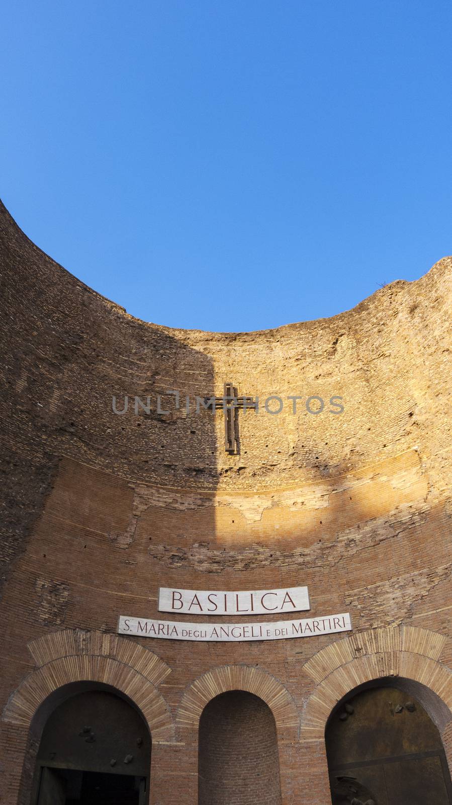 Facade of the Basilica of St. Mary of the Angels and the Martyrs - Santa Maria degli Angeli. Rome, Italy. An interesting church designed in the mid 16th century by Michelangelo.