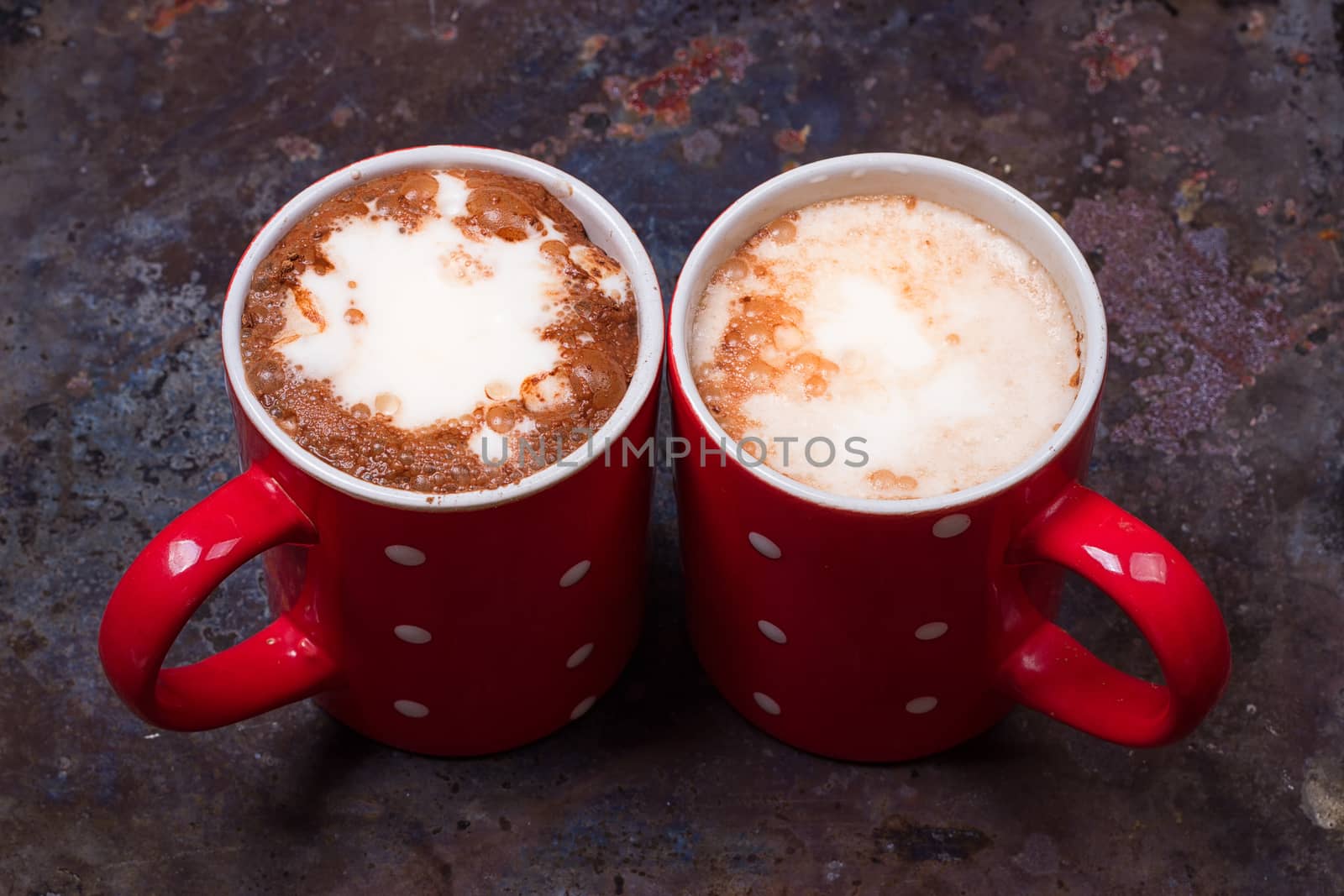 Two coffee cups for lovers prepare for morning coffee with copy blank space for writing on rustic grunge background