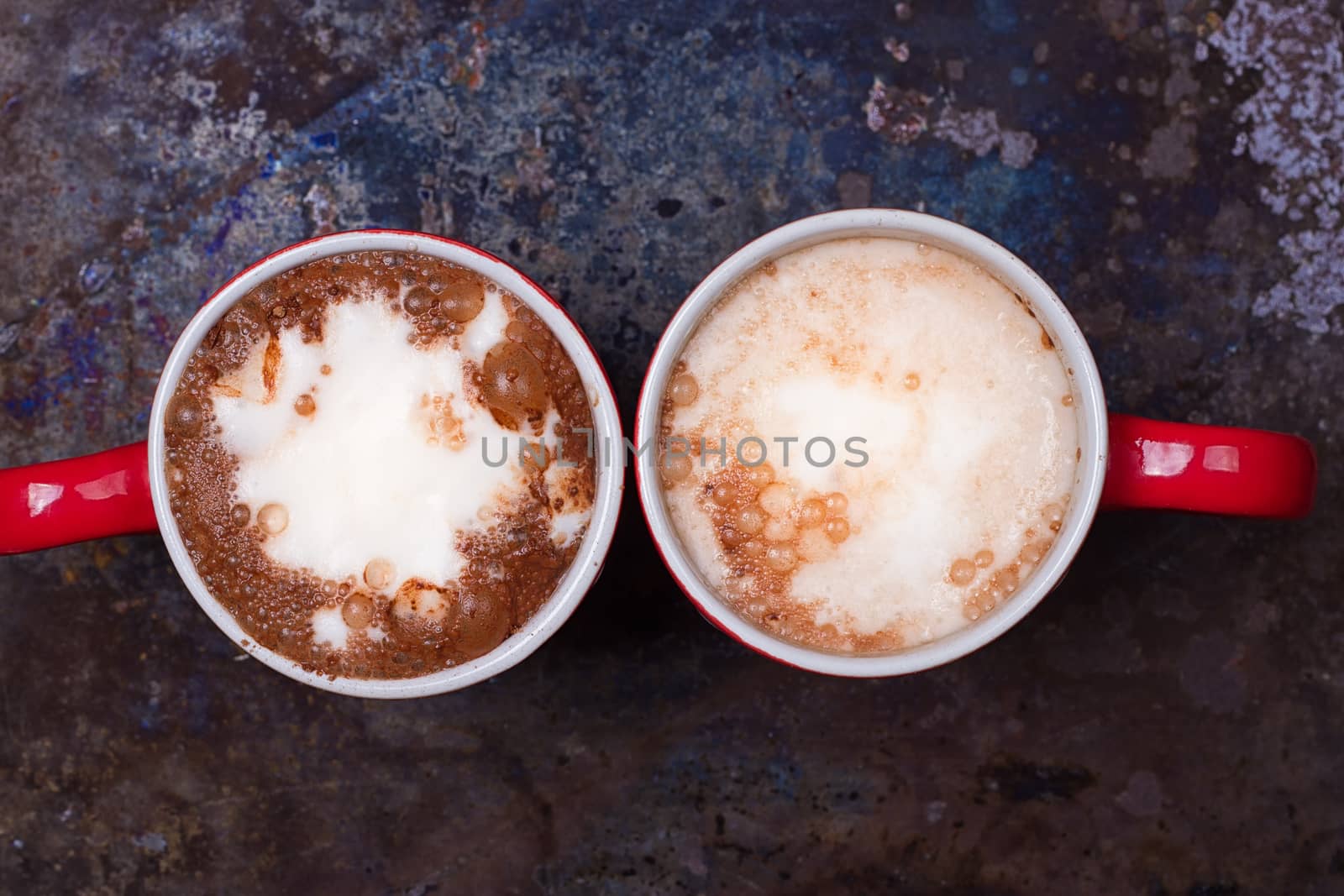 Two coffee cups for lovers prepare for morning coffee with copy blank space for writing on rustic grunge background