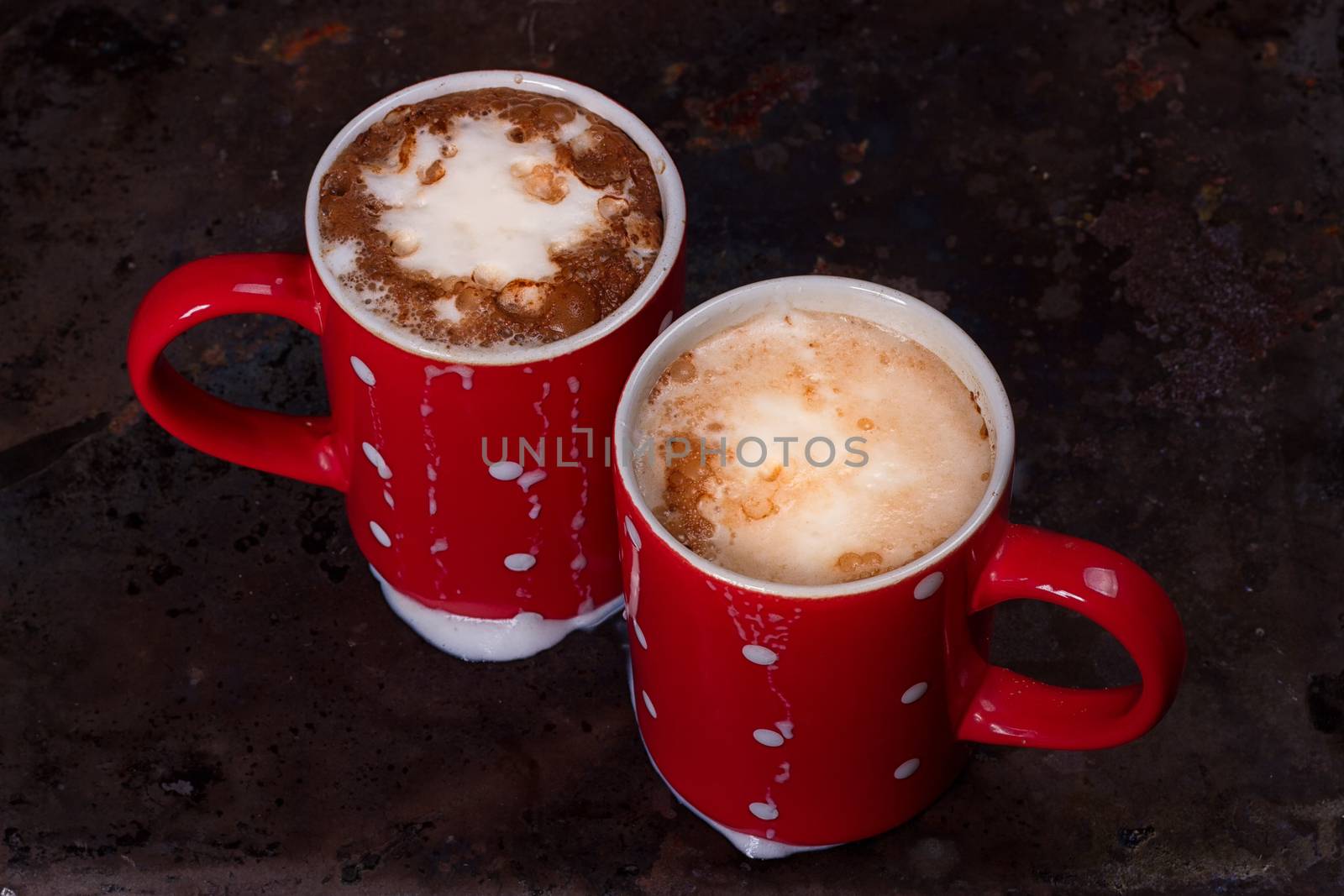 Two coffee cups for lovers prepare for morning coffee with copy blank space for writing on rustic grunge background