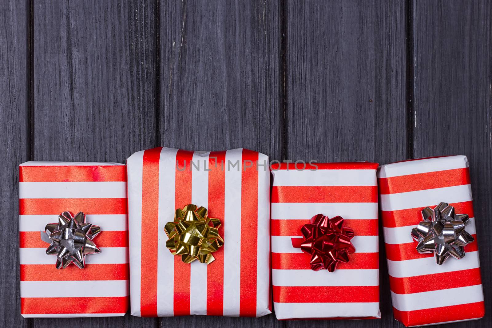 Top view of various gift boxes on wooden table