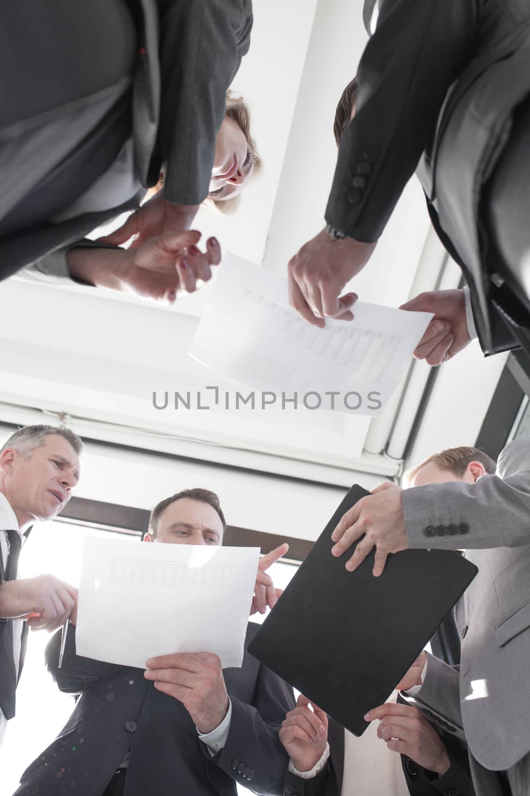 Business people work with documents by ALotOfPeople