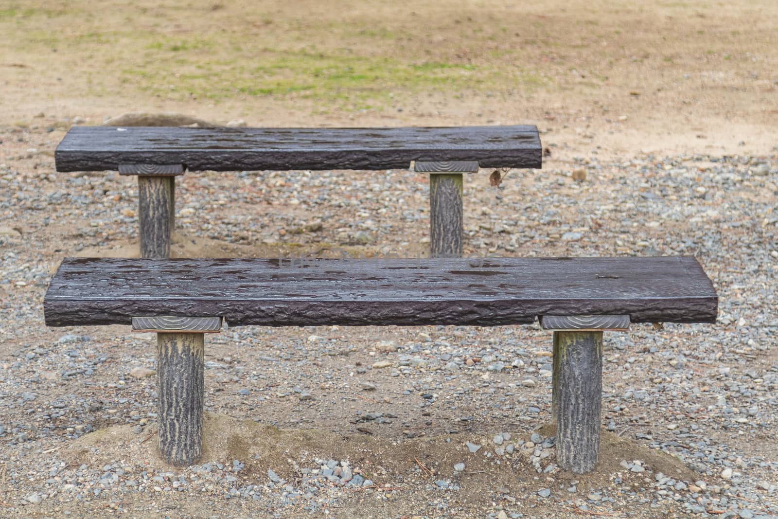 wet empty bench in the park