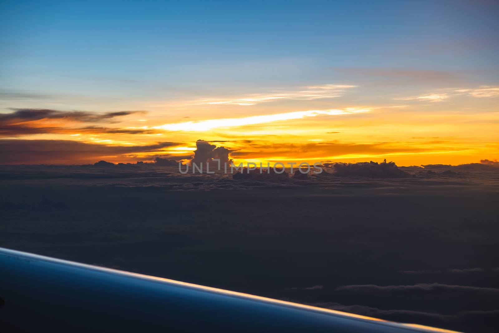 sunset view from airplane window by luckyfim