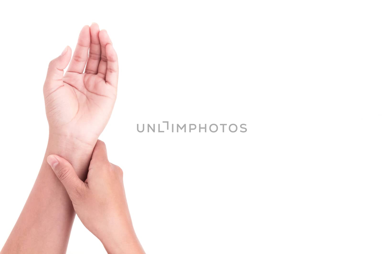 Woman's hand checking pulse on wrist, health care and medical concept