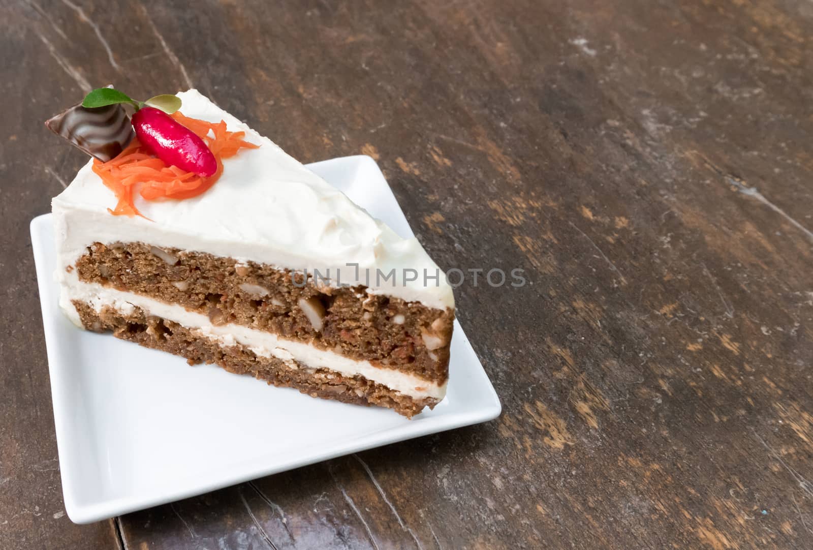 Carrot cheesecake , carrot cake on wood table background