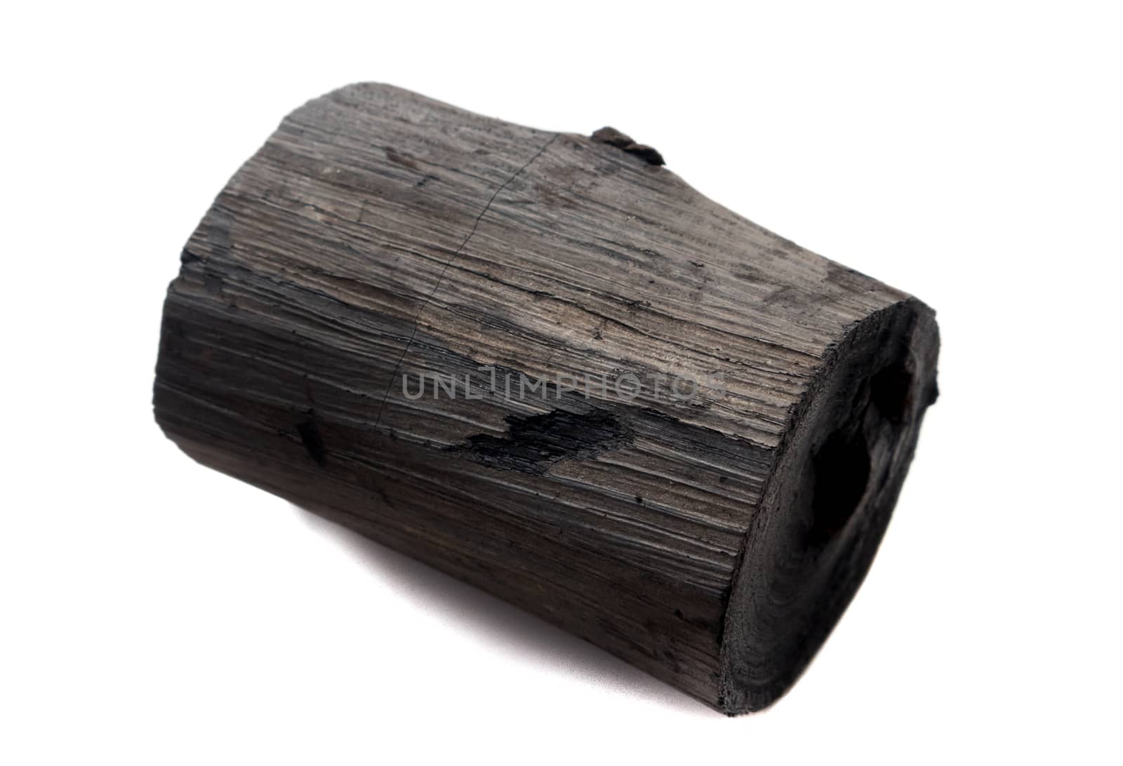 black charcoal on white background, raw material for make cooking