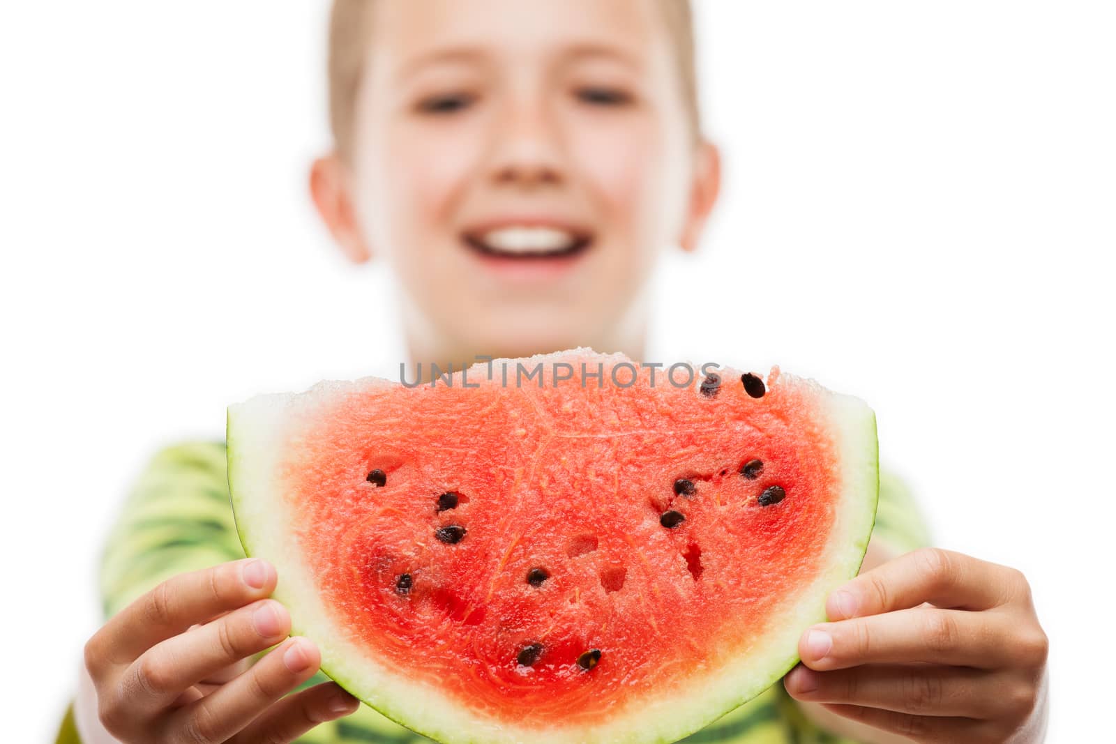 Handsome smiling child boy holding red watermelon fruit slice by ia_64