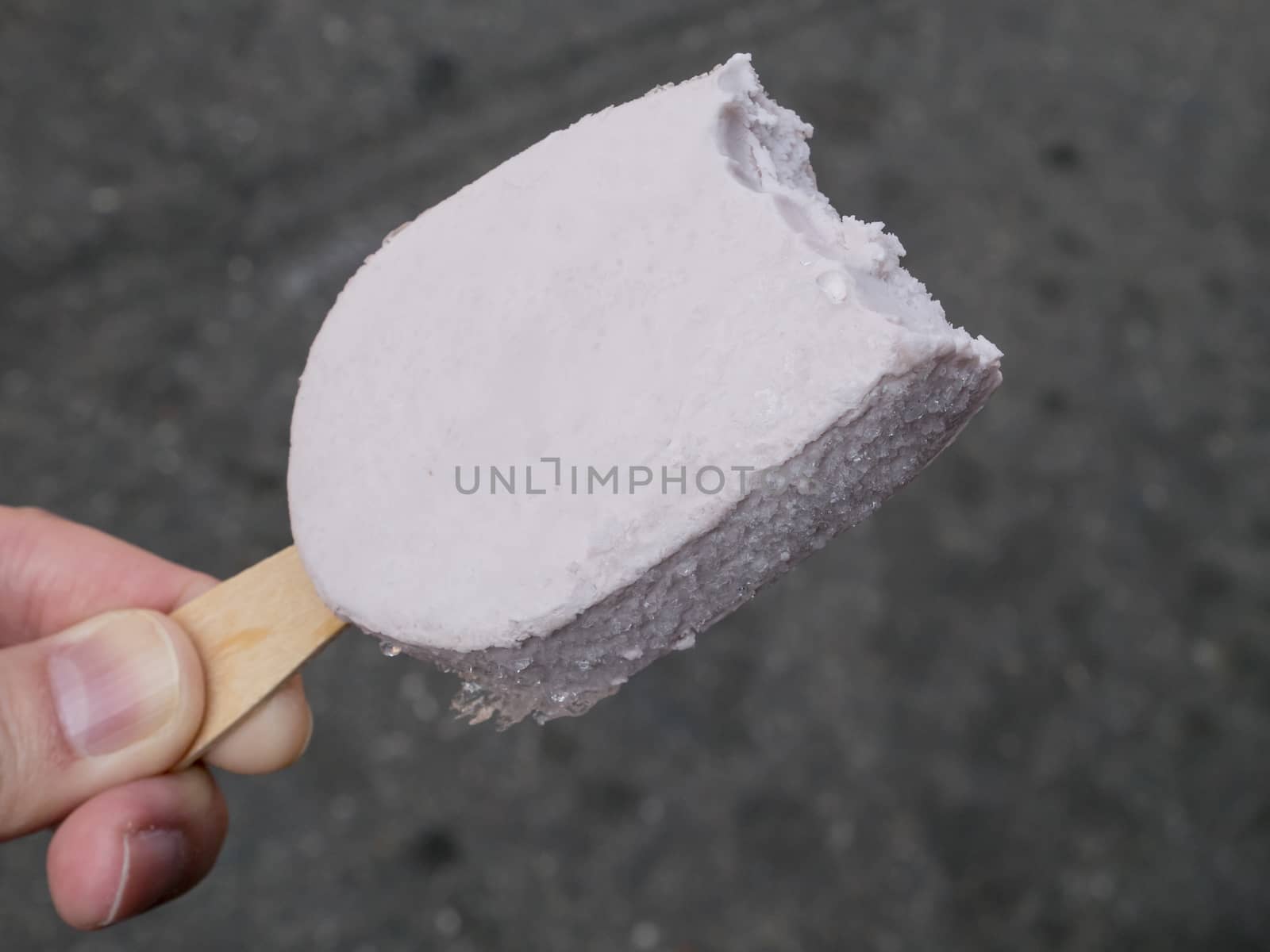 The close up of delicious taro ice-cream at street.