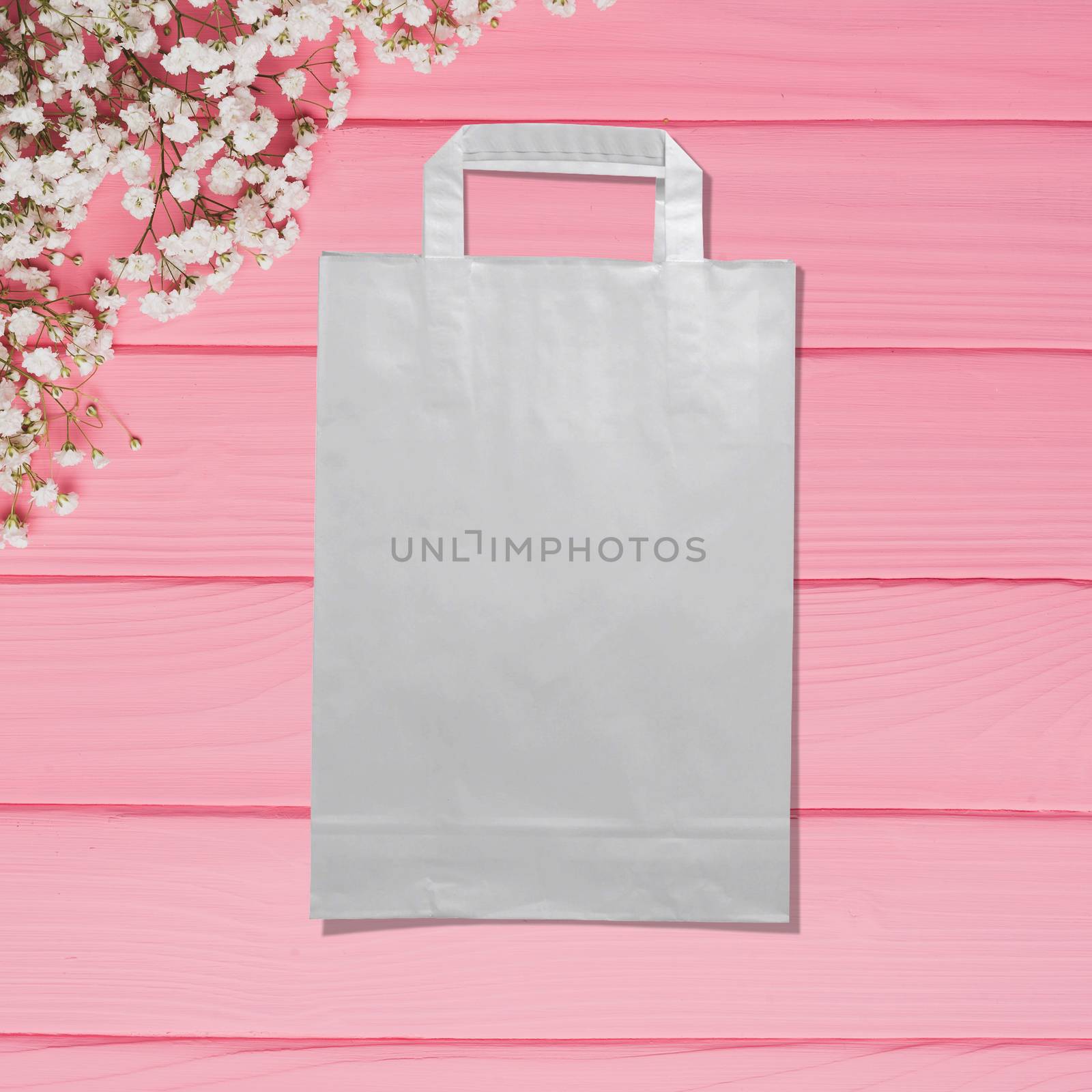 light poly bag for shopping on a pink background