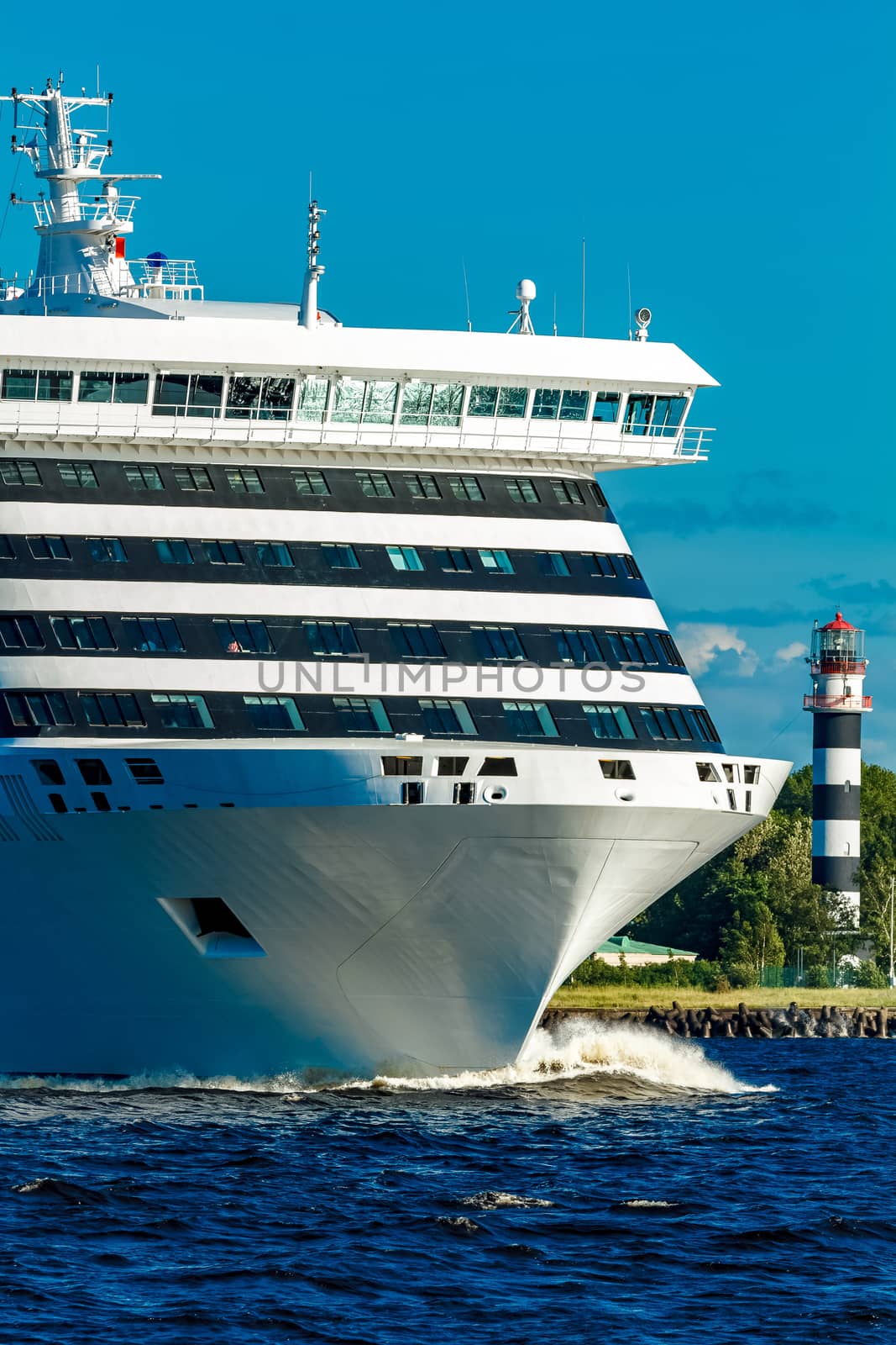 Big white cruise ship sailing to the Baltic sea at clear day