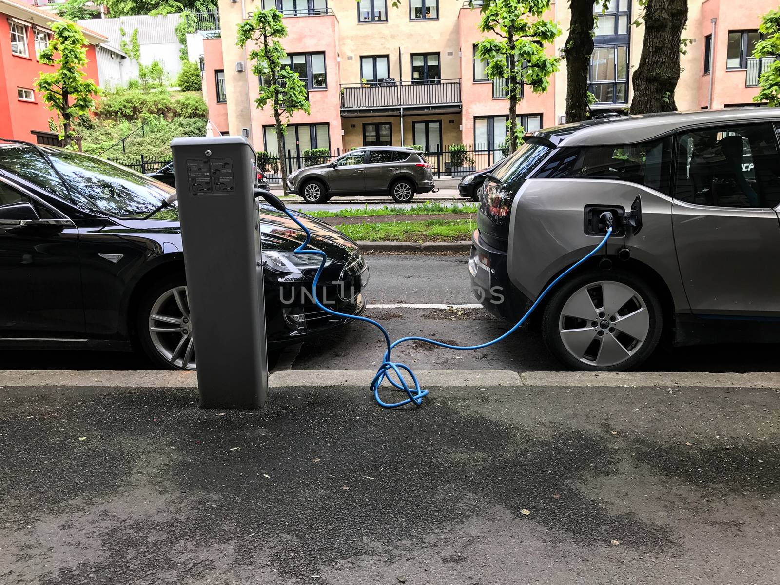 Electric car charging station in Oslo. Eco automobile that sparked a revolution