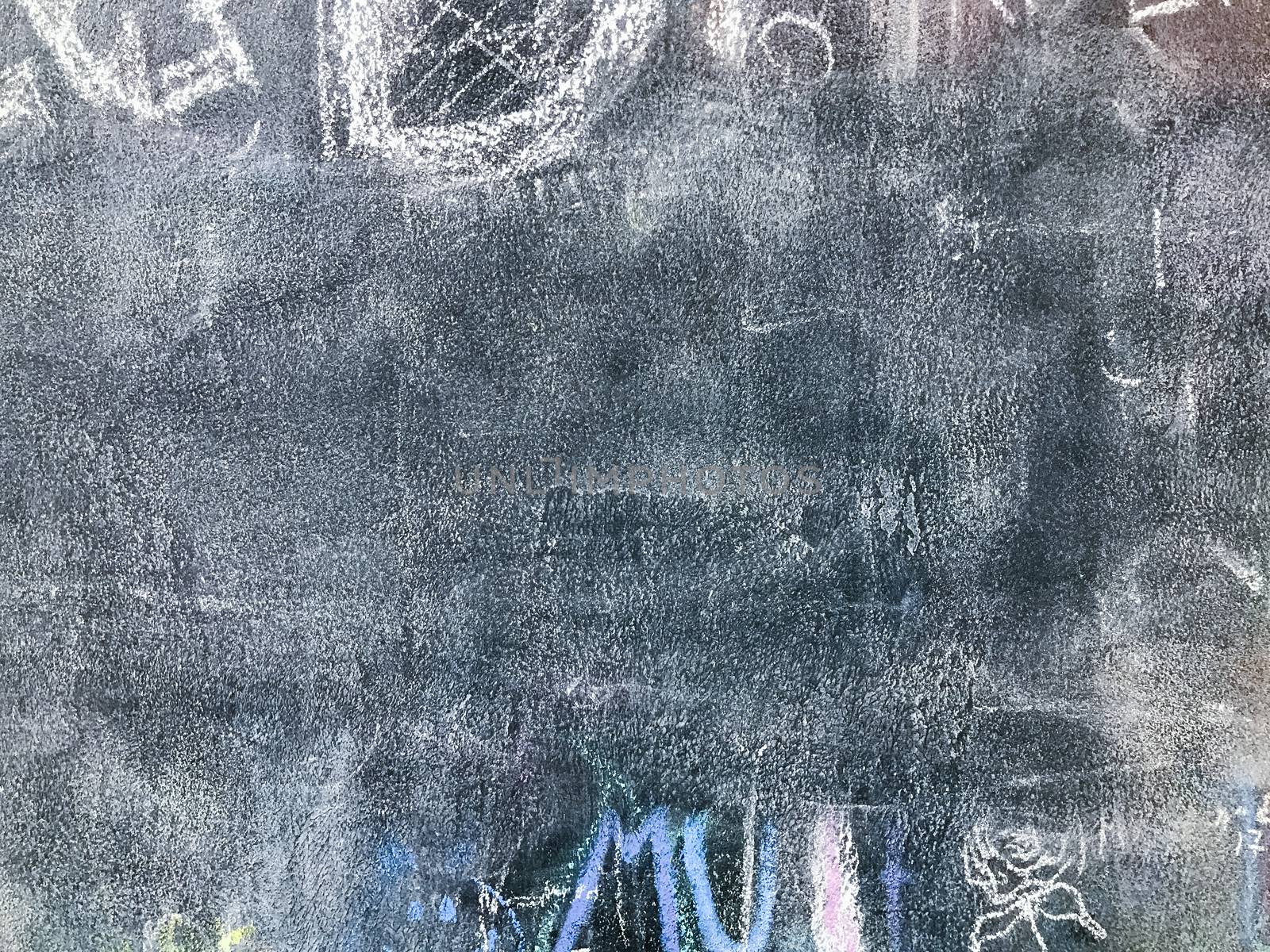 Back to school. Background with children scribbles painted by colorful chalk