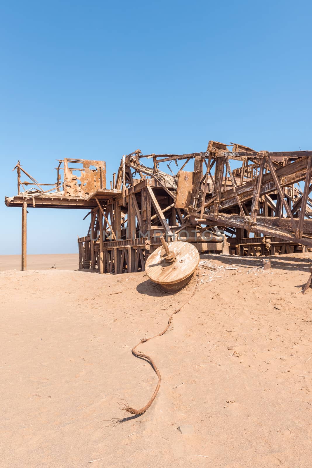 The rusted remains of an abandoned oil drilling rig between Henties Bay and Torra Bay in the Skeleton Coast area of Namibia