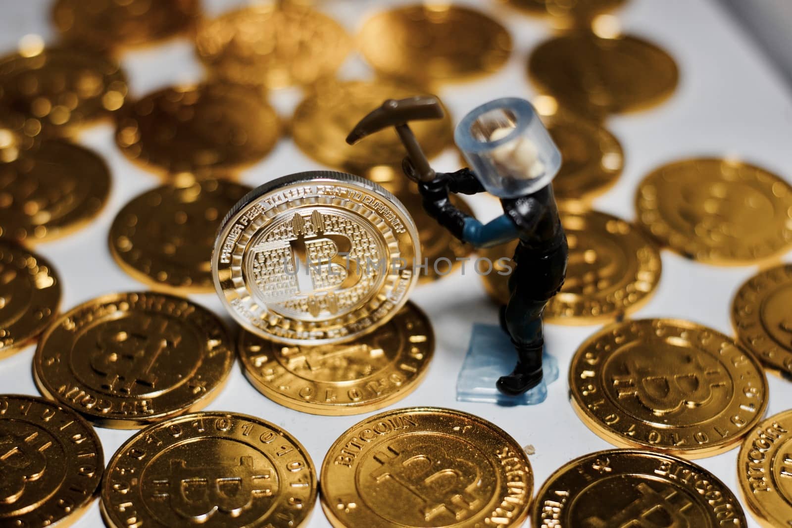 Digital currency physical metal bitcoin coin. Business mining concept.