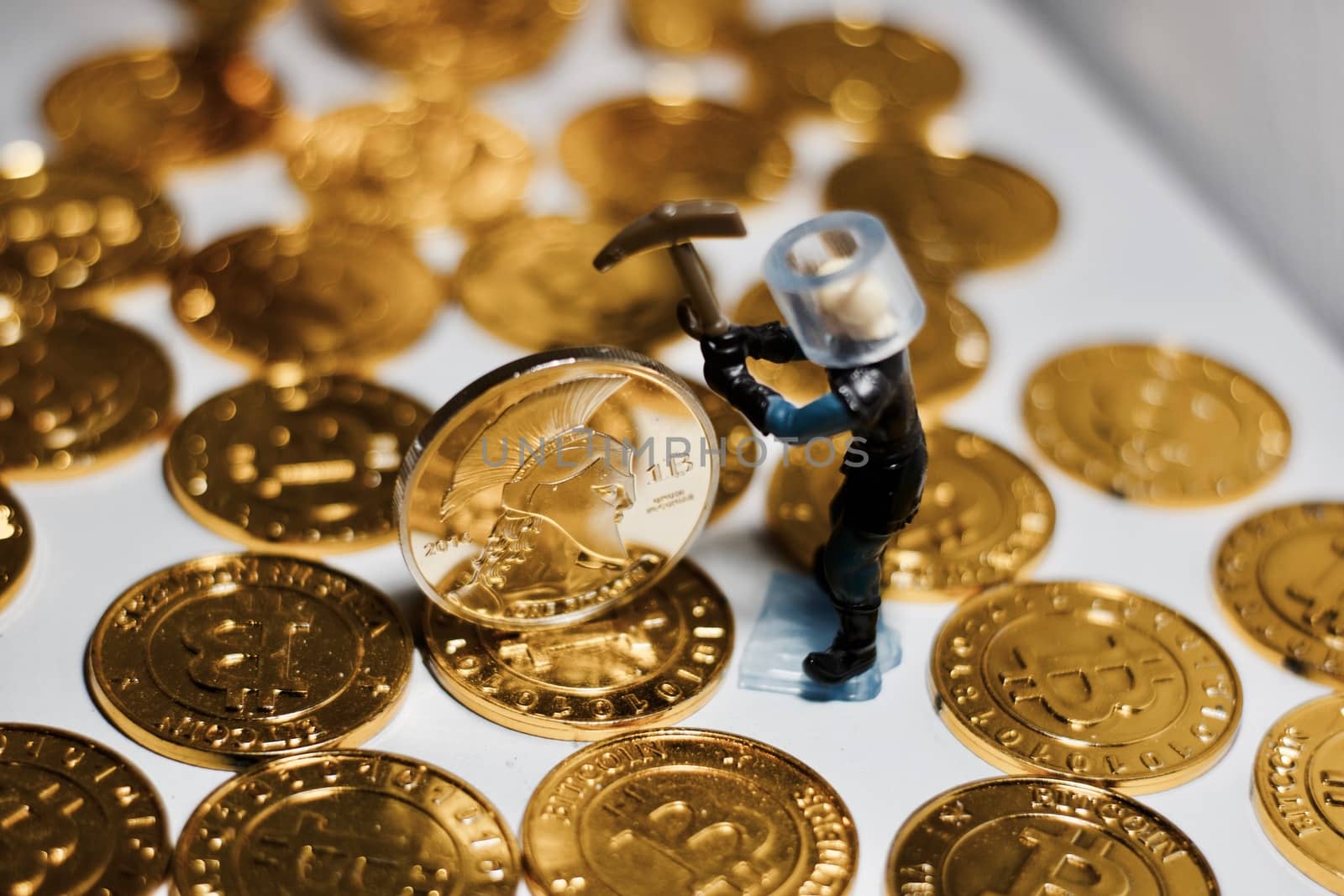 Digital currency physical metal bitcoin coin. Business mining concept.
