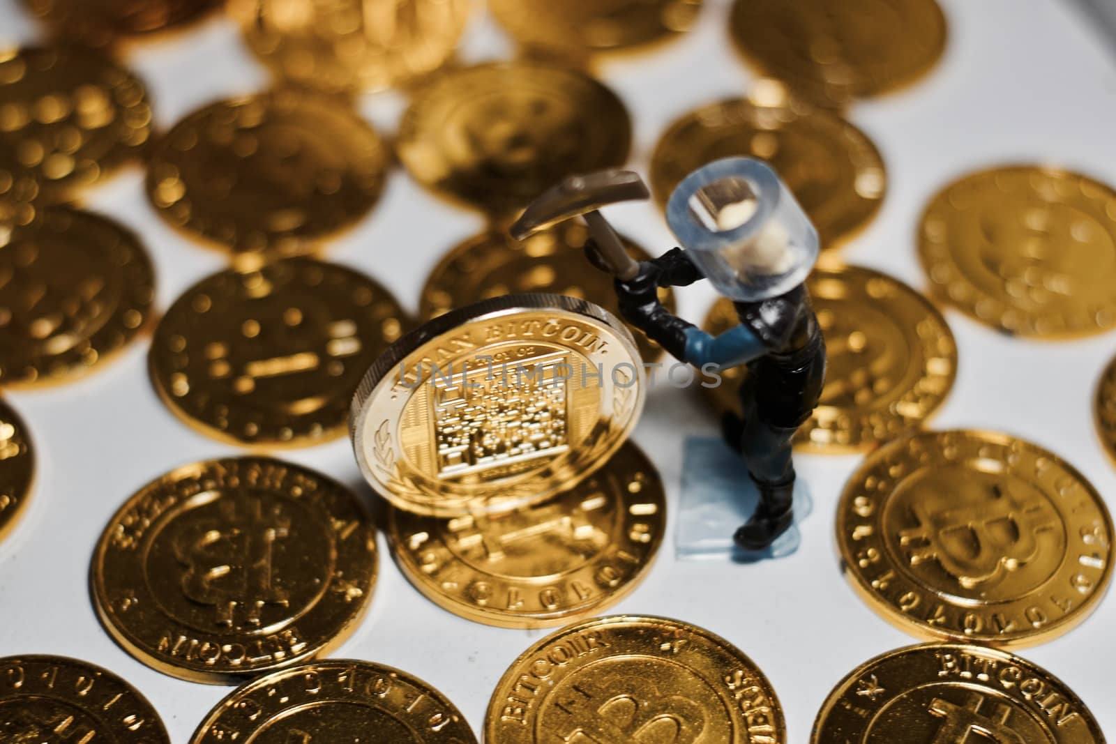 Digital currency physical metal bitcoin coin. Business mining concept.